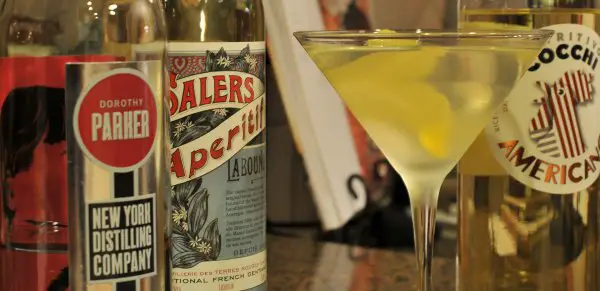 White Negroni served up in a martini glass